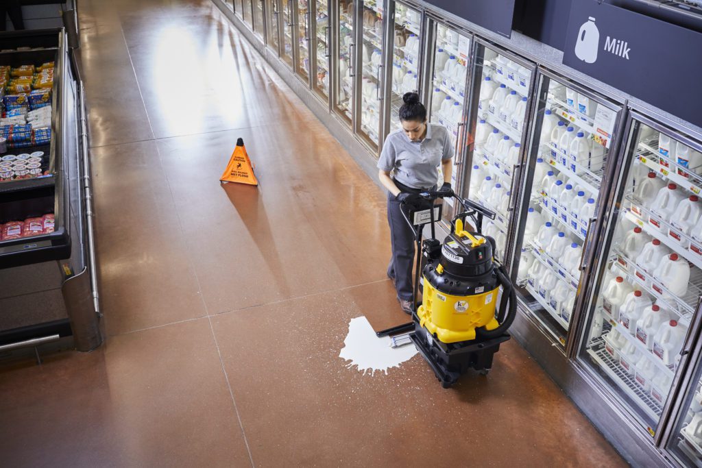 cleaning spills from grocery store floors